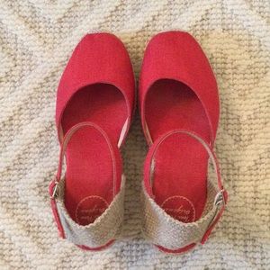 A pair of red espadrilles